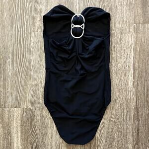 EUC Maje Black Bodysuit Size 1/ Small Silver Ring Hardware Criss Cross Back Chic